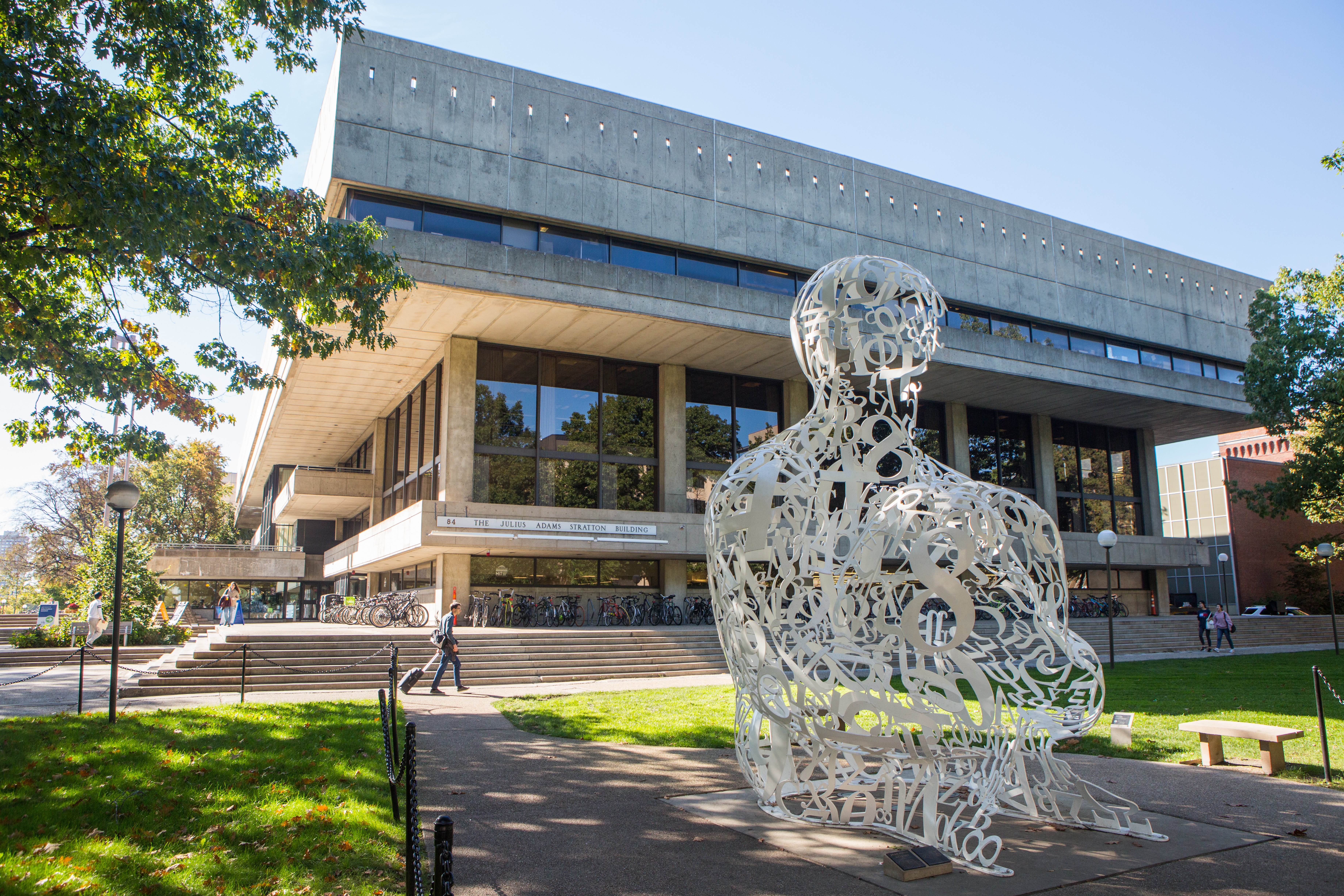 Sculpture of a man in on MIT Campus