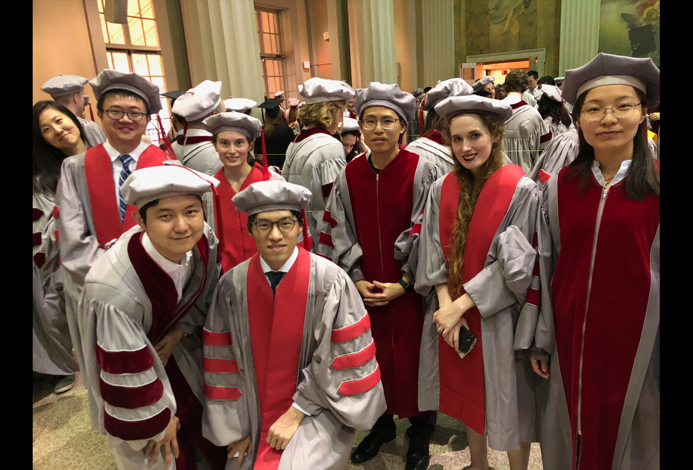 Doctoral students from the Department of Chemistry prepare to receive their hoods.