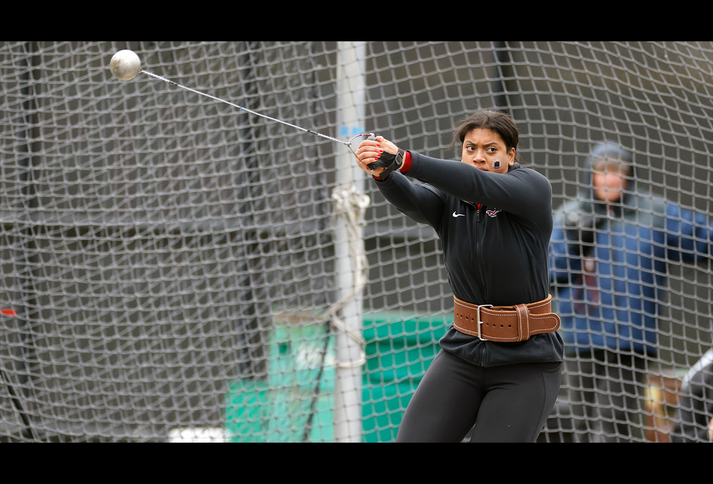 Alexis Boykin participates in a shotput competition.