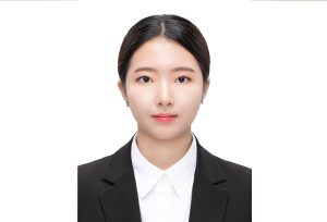 Jihye Roh smiles against a blank white background.