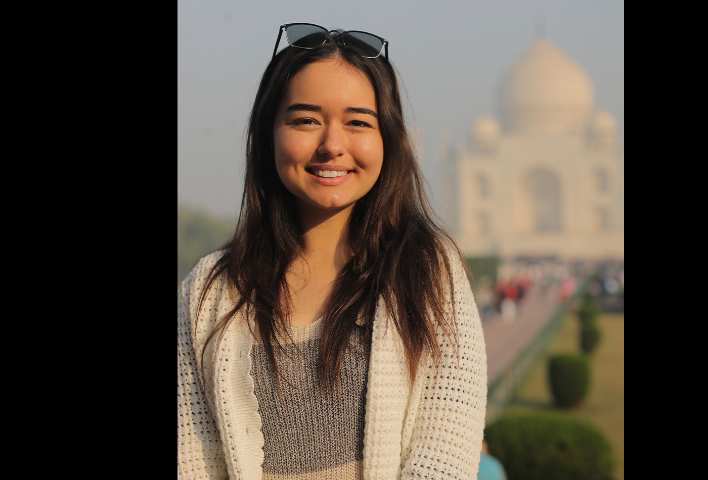 Dilyara Sharipova smiles in front of the Taj Mahal.