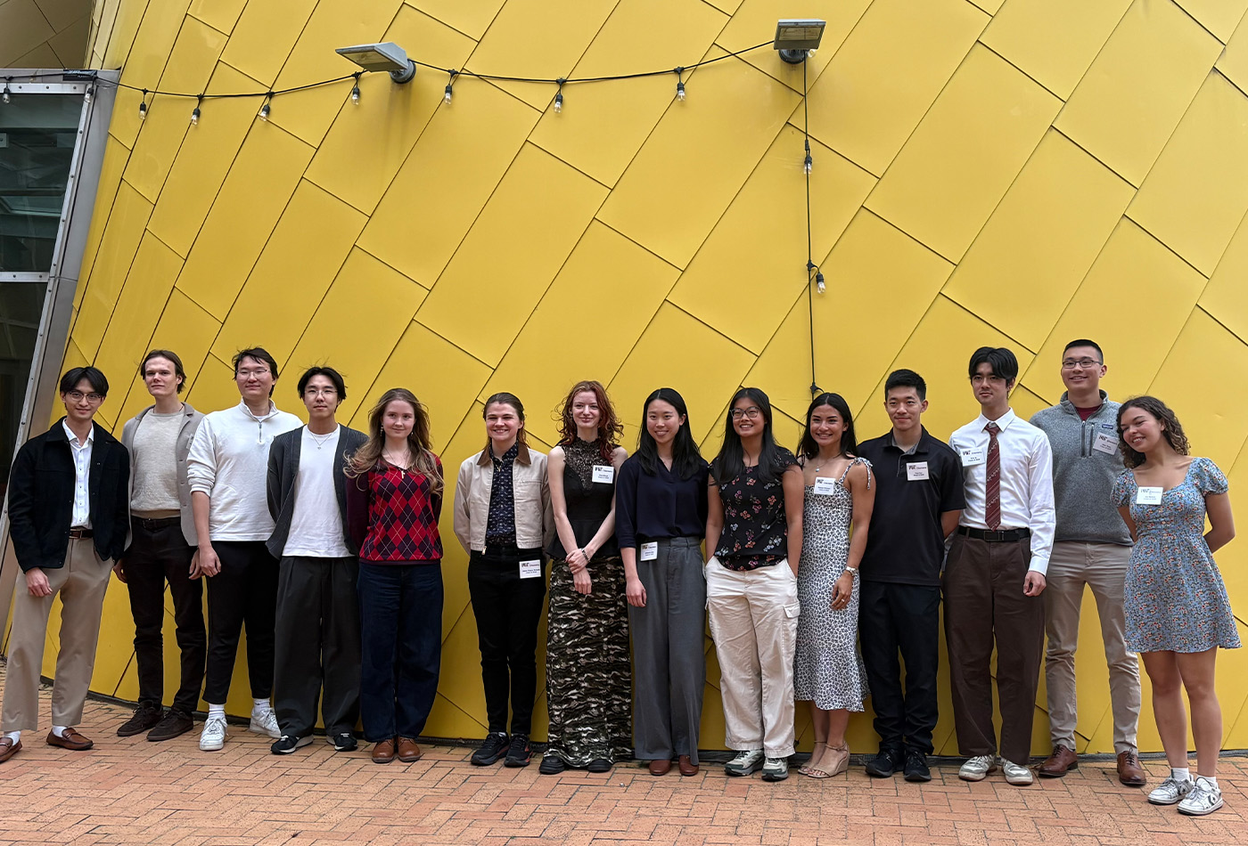 The Chemistry Class of 2026 stands in line outside the Stata Center.
