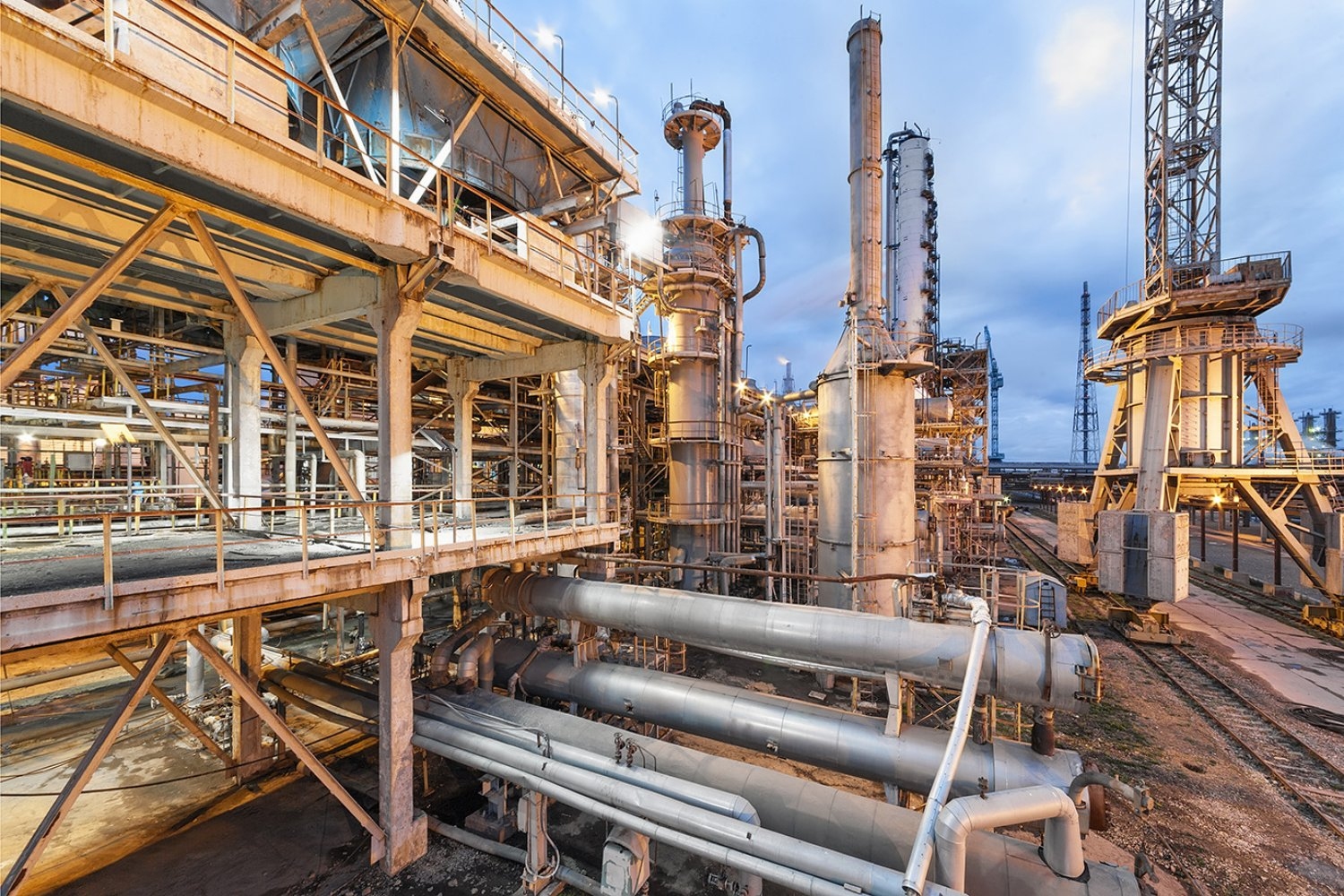 Today, most ammonia is produced using the Haber-Bosch process, a century-old method that relies on fossil fuels, in facilities like the one pictured. MIT researchers are developing computational approaches to identify materials that could enable a more sustainable alternative.